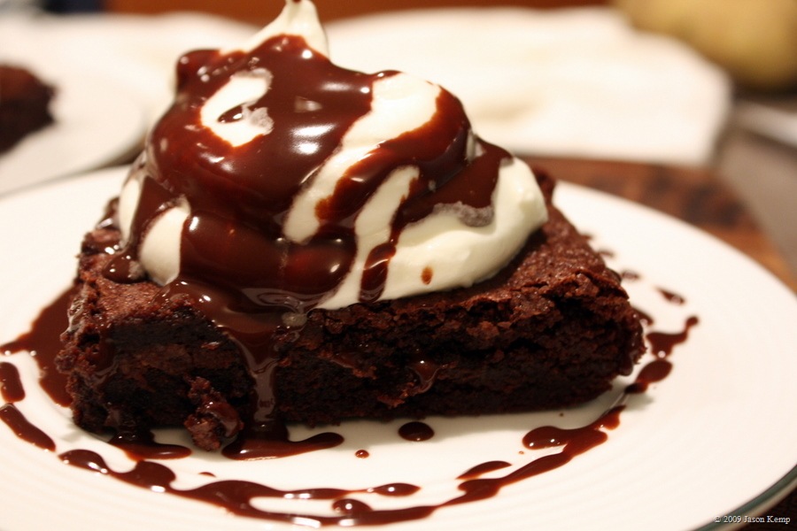 Brownies with Whipped Cream and Chocolate Sauce
